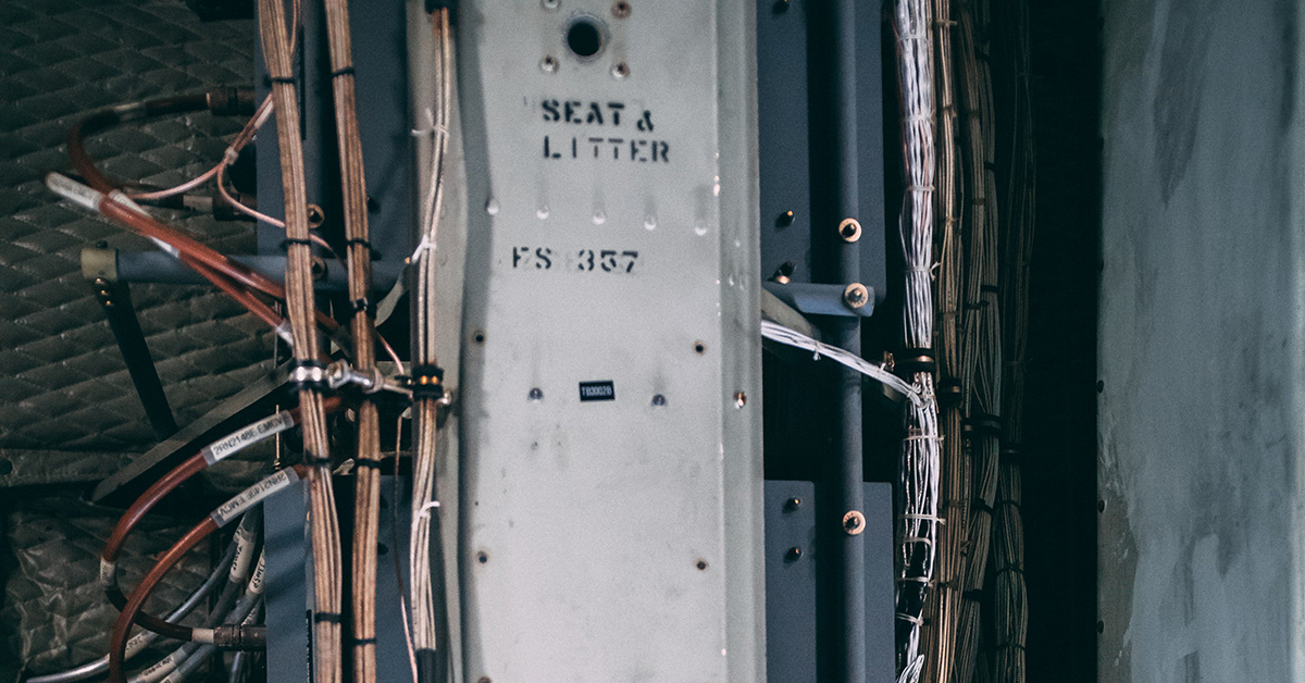 Picture of machinery labeled Seat A, and litter with wires around it.