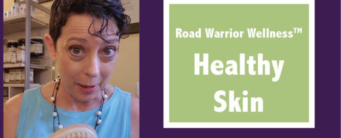 Graphic with Dr. Mary Warren on the left holding a dry brush and a green text box saying Road Warrior Wellness, Healthy Skin on the right over a purple background and above the website road-warrior-wellness.com.